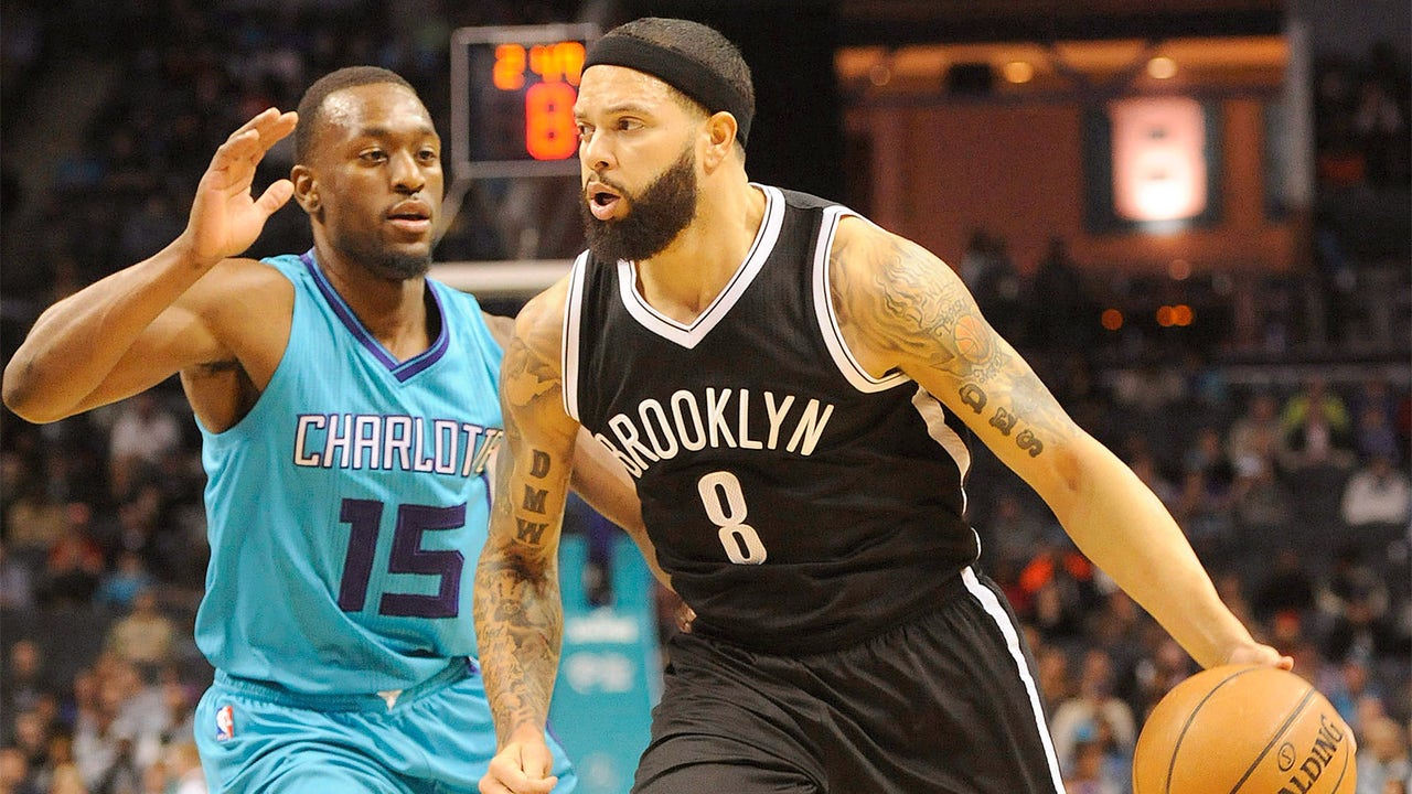 Johnson, Nets catch fire from long range in rout of Hornets